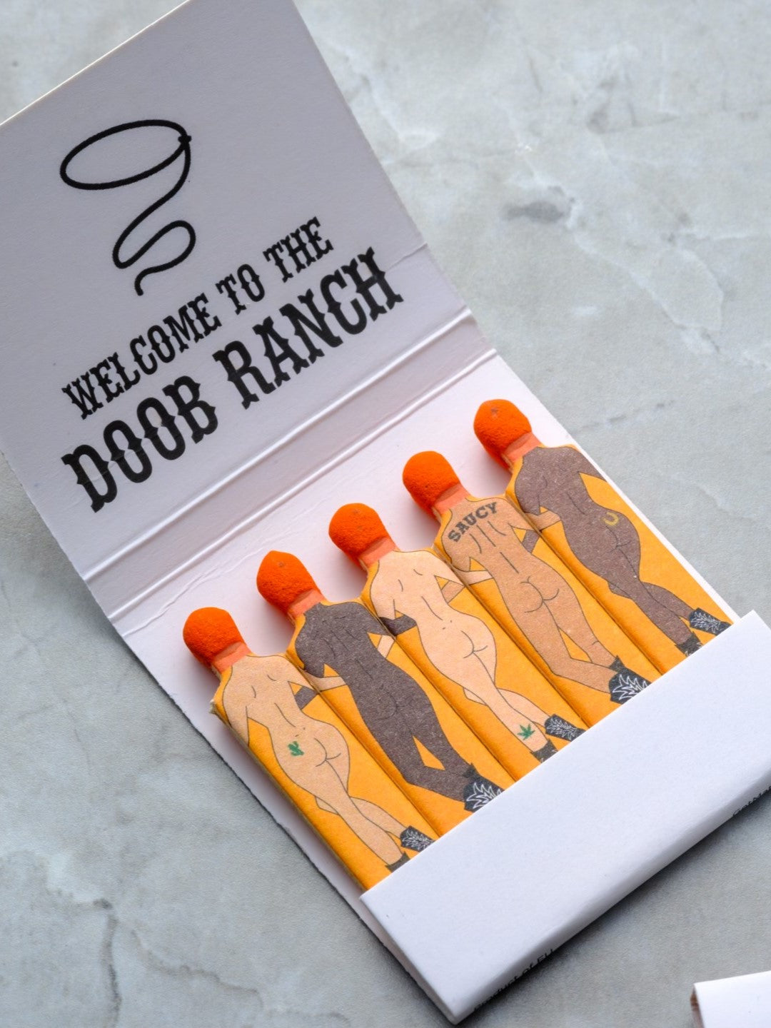 Doob Ranch safety matches are part of the SendNudes match collection and are a collaboration product with Dose of Saucy infused condiments.