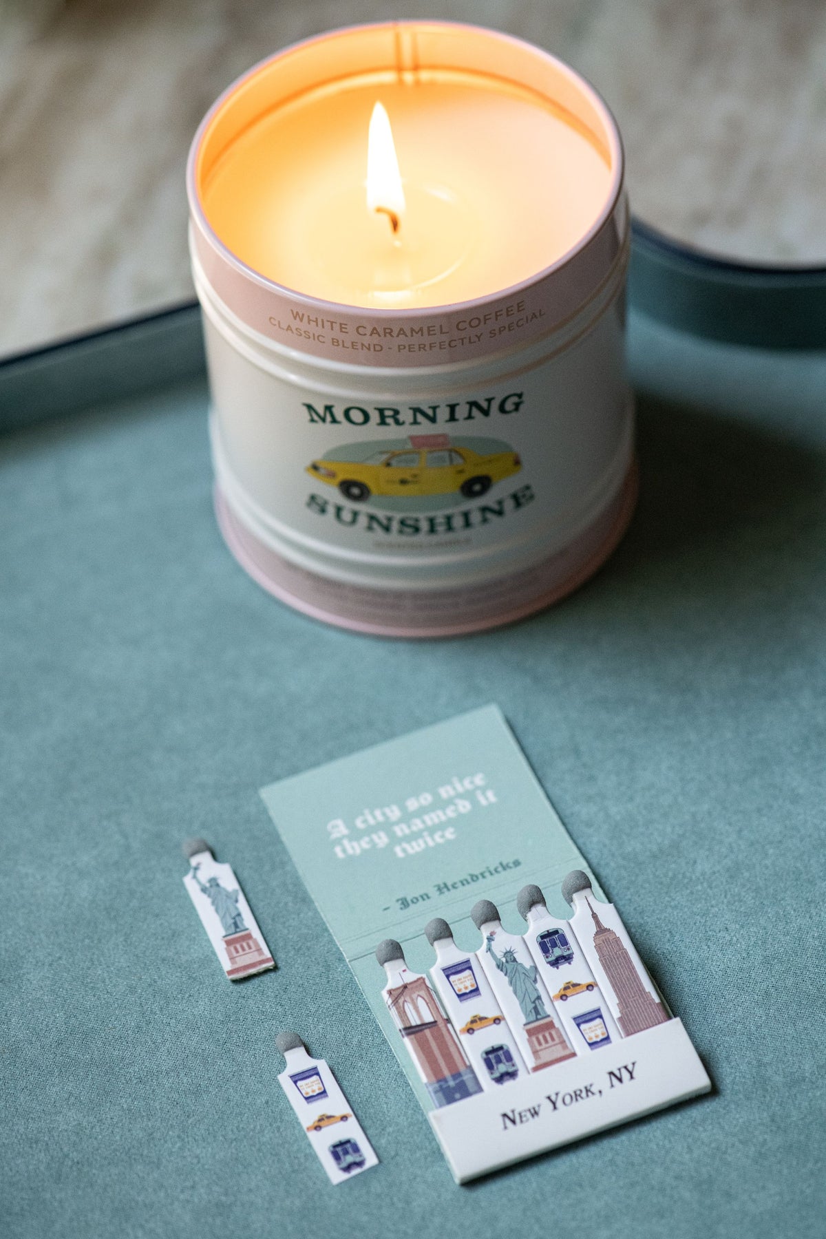 Rogue Paq loves NY matches open to show the stems. Lit in the background is a taxi candle.