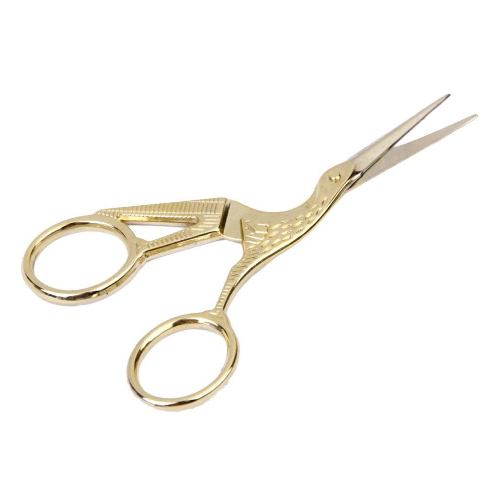 Rogue Paq Open Crane Bud Trimming Scissors, White background. A macro shot of the open scissor blades. The ultra-fine, pointed tips are engineered for surgical precision, ideal for delicate tasks like trimming rolling papers or manicuring cannabis flower with accuracy.