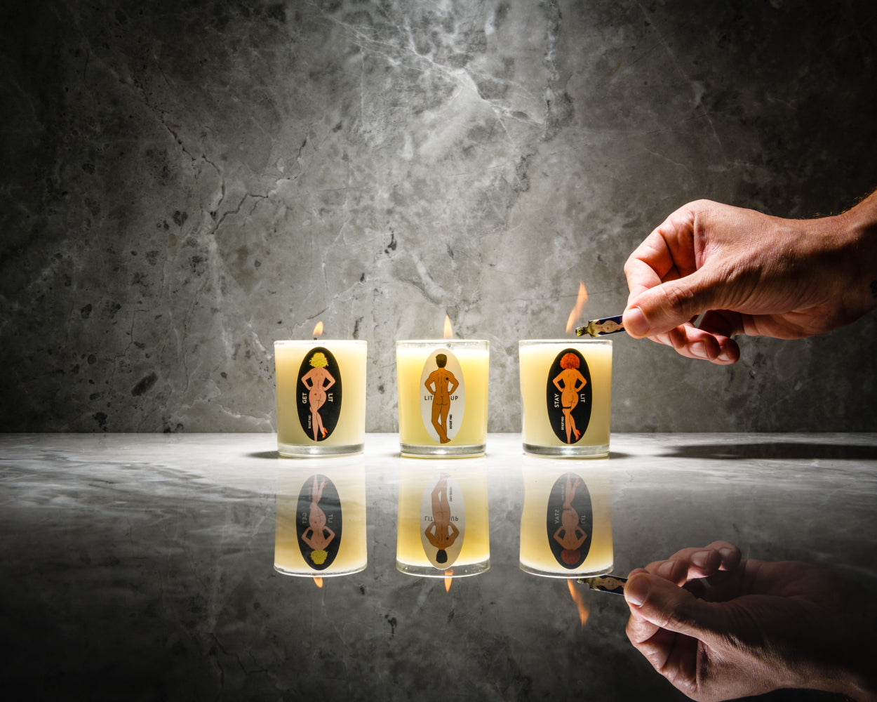 This trio of 2oz massage candles are all natural and use therapeutic grade essential oils only. The wicks are hemp coated in bees' wax. The candles are being lit with a SendNudes match.